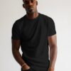 round-neck-tshirt-mockup-on-african-model-in-professional-studio-scene1-0338 black t shirt