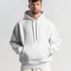 young-male-model-with-frizzy-hair-wearing-hoodie-mockup-in-minimalistic-background-scene1-078 off white hoodie