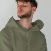 young-male-model-with-frizzy-hair-wearing-hoodie-mockup-in-minimalistic-background-scene3-075 (3) hoodie