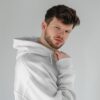 young-male-model-with-frizzy-hair-wearing-hoodie-mockup-in-minimalistic-background-scene5-073 off white hoodie