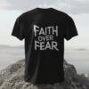 3d-tshirt-mockup-on-rock-in-front-of-sea-background-0324 - 2025-02-09T143515.570 black