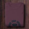 folded-tshirt-mockup-flatlay-on-table-0084 - 2025-02-09T144026.477 maroon